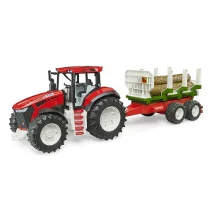 Tracteur Roadmax avec remorque forestière et 3 troncs